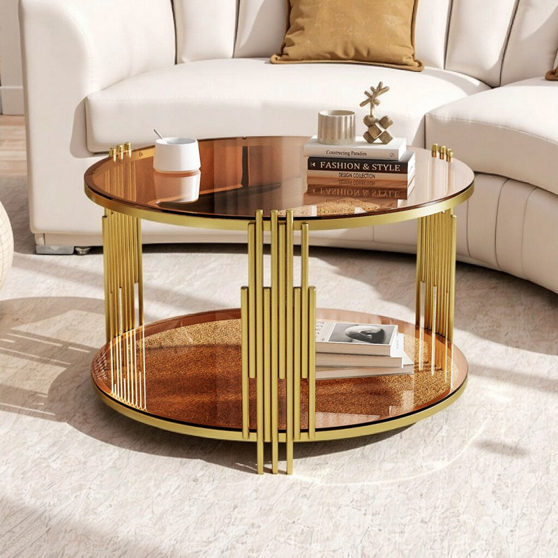 Table basse moderne en verre brun avec base tambour doré et tablette inférieure