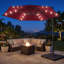 Parasol de patio en porte-à-faux décalé de 10 pi, lumières chaudes à économie d'énergie à DEL à énergie solaire, auvent imperméable résistant à la décoloration UV50 + et cadre résistant à la rouille-1589002736