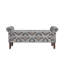 Pouf de rangement à couvercle rabattable avec assise rembourrée, revêtement en polyester à motif floral bonsaï et structure en bois massif, de forme rectangulaire.