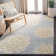 Coreatha Hand Tufted Wool/Cotton Floral Rug in Cement