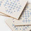 Ensemble de 4 sous-verres en MDF et résine Perfora blanc et bleu