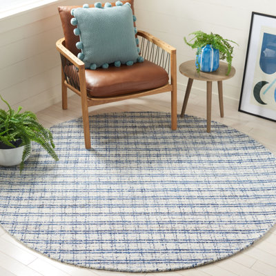Tapis bleu / ivoire en laine / coton touffeté à la main à motif abstrait Nakara