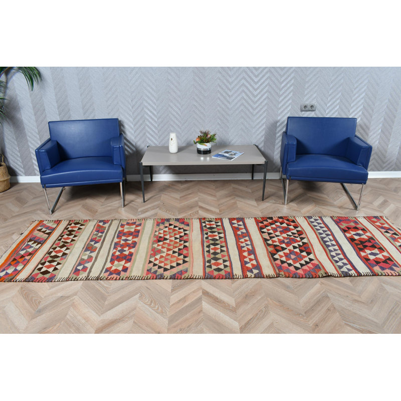 Tapis de style kilim turc tissé à la main avec motifs anatoliens colorés pour un décor bohème chic dans un motif géométrique éclatant