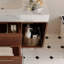 Meuble-lavabo mural flottant de 39,4 po avec lavabo en céramique, 2 tablettes ouvertes, pierre frittée blanche, conception moderne pour une utilisation de l'espace