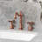Kingston Brass Essex Two-Handle 3-Hole Deck Mount Widespread Bathroom Faucet with Pop-Up Drain-110561888