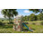 Two-Story Outdoor Playhouse for Kids, Wooden Kids Playhouse with Slide, Bench, BBQ Play Kitchen, Flat-Step Ladder, Lookout Platform and Clock for Age 2+ Backyard Play, Brown