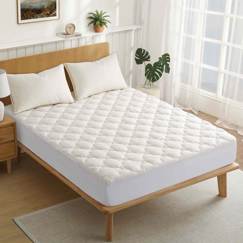 Protège-matelas en duvet synthétique et tissu biologique, Simple TG