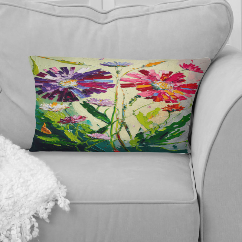 Coussin décoratif imprimé floral rouge et mauve