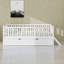 Lit plateforme en bois avec garde-corps et lit gigogne-348429107