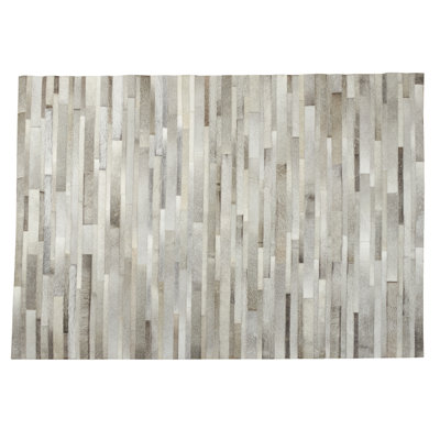 Tapis gris en cuir de vache fabriqué à la main Tappeto