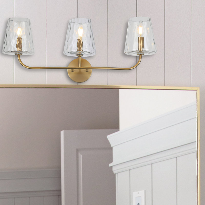Éclairage pour meuble-lavabo à 3 lumières Arvell, Laiton vieilli
