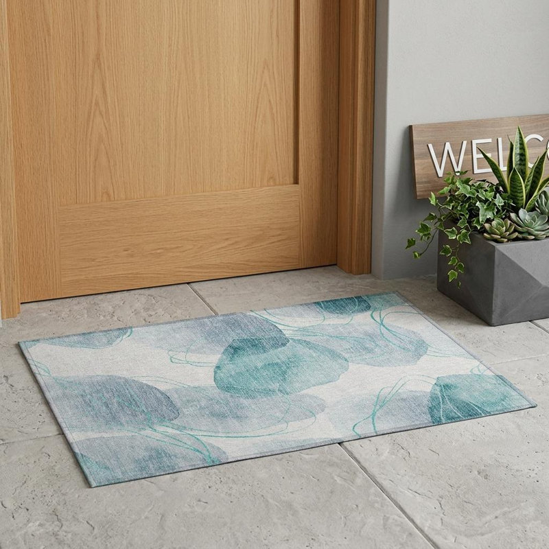 2' X 3' Teal and Ivory Abstract Washable Non Skid Indoor Outdoor Area Rug
