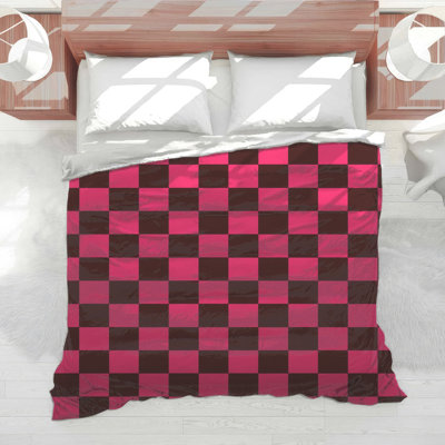 Édredon à carreaux rose et noir