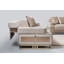 Canapé moderne en tissu beige avec base en métal doré et coussins décoratifs