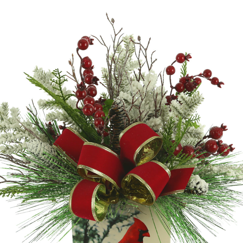 Snow Covered Greens And Berries In Cardinal Vase