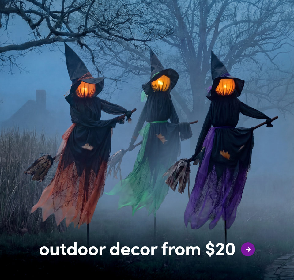A black cat walks through a blue front door decorated for Halloween with a tiered ghost sign, a pumpkin lantern, and a doormat that reads I Put A Spell On You, with text promoting outdoor decor from $20.