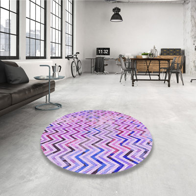 Tapis rond mauve tissé à la machine 8 pi