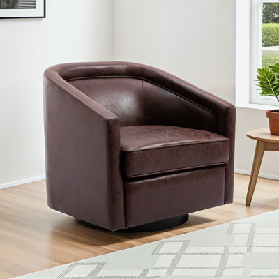 Kiersten Faux Leather Swivel Barrel Chair