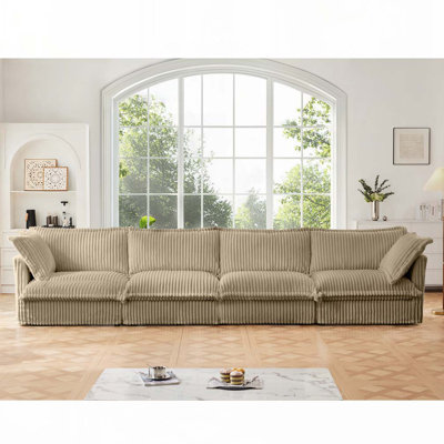 Canapé 4 places avec accoudoirs souples, assise profonde