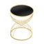 Élégante table d'appoint avec surface en miroir noir et support en métal doré surmonté d'un support robuste pour tout le monde