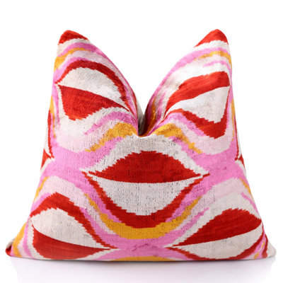 Coussin décoratif en velours rose et rouge