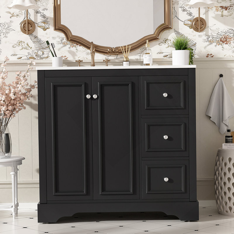 Meuble-lavabo de 36 po de style transitionnel avec lavabo en céramique - comprend 2 portes à fermeture en douceur, une tablette réglable en forme de U, 3 tiroirs (dont un avec cloison), une finition peinte et un grand espace de rangement