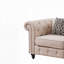 Fauteuil d'appoint capitonné beige avec coussin