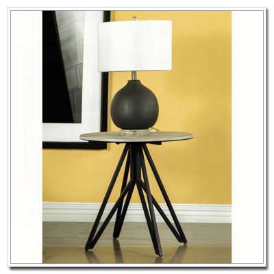 Table de bout ronde en ciment et bronze industriel Hadi