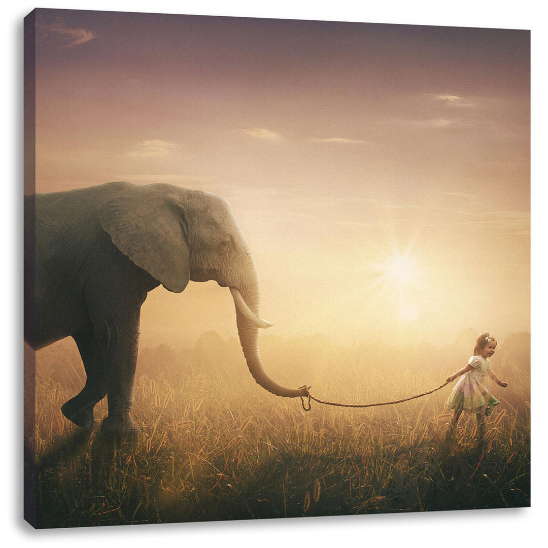 Leinwandbild Kind und Elefant bei Sonnenuntergang