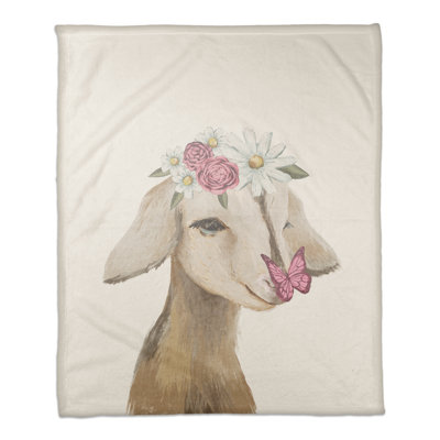 Jeté mignon bébé chèvre
