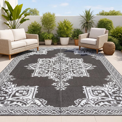 Tapis d'extérieur pliable et imperméable en paille Dory Medallion Border
