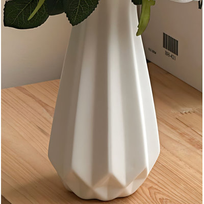 Bouquet de fleurs roses dans un vase