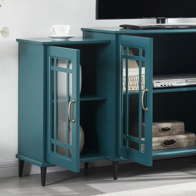 Buffet de 157 cm (62 po) bleu turquoise, fabriqué avec des matériaux de qualité et des composants en verre. Structure de meuble télé bleue. Aménagement d'étagères pratique.
