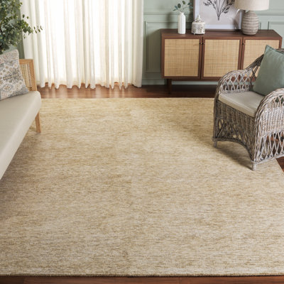 Tapis en coton touffeté à la main ébène ivoire / doré