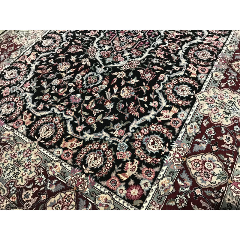 Tapis noir et rouge de haute qualité noué à la main
