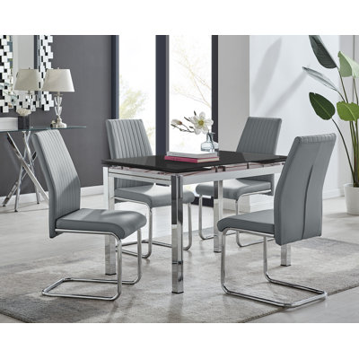 Ensemble de table de salle à manger extensible en verre et en métal Tierra et 4 chaises de salle à manger en similicuir de luxe