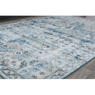 https://assets.wfcdn.com/im/45012455/resize-h310-w310%5Ecompr-r85/2479/247971183/freya-vintage-bluebell-area-rug.jpg