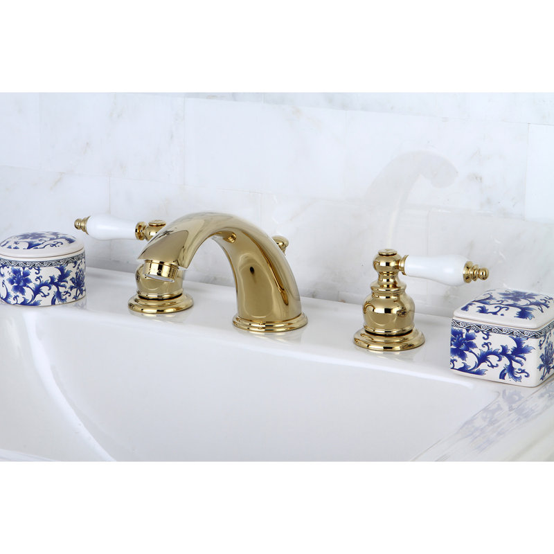 Kingston Brass Victorian Two-Handle 3-Hole Deck Mount Widespread Bathroom Faucet with Brass Pop-Up Drain
