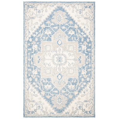 Tapis oriental ivoire / bleu en coton touffeté à la main Cyrrilagnin
