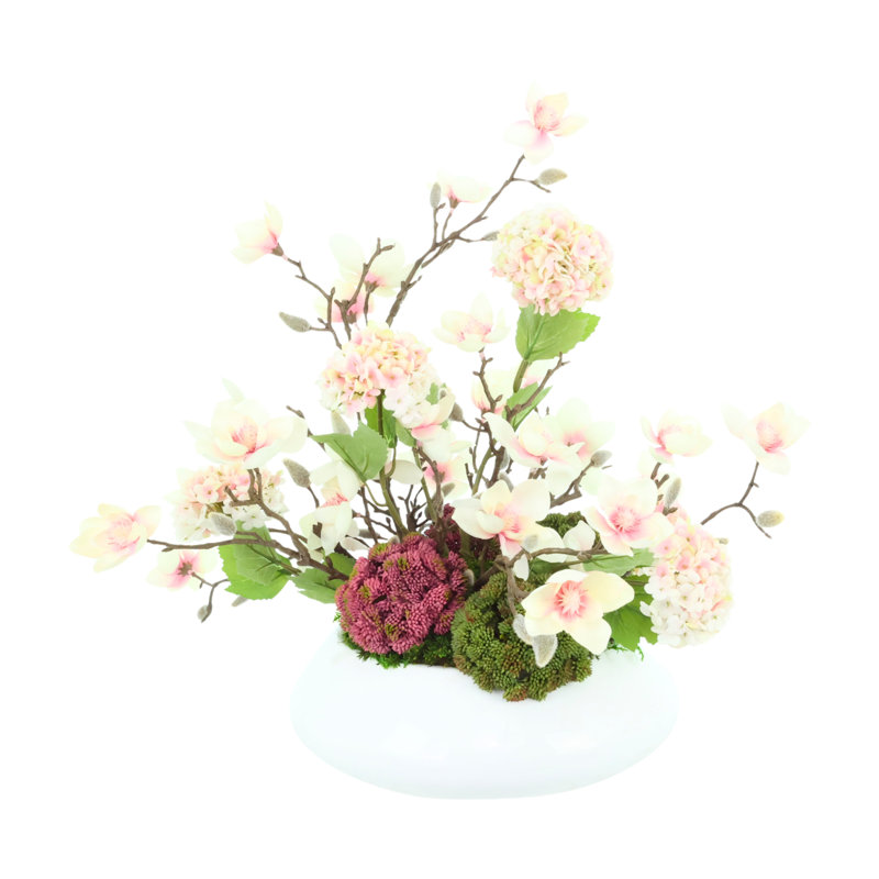 Arrangement floral hydrangées et magnolias