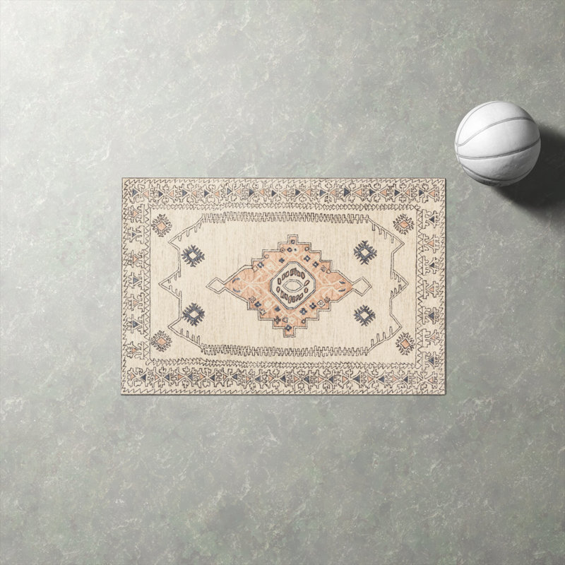 Ivory and Peach Hand Tufted Wool Area Rug 5' x 7'6"