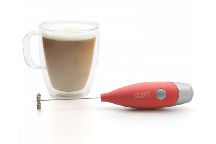 coffee in mug with milk frother