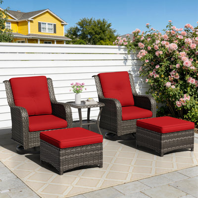 Ensemble de conversation en rotin pour 2 personnes avec 2 repose-pieds, 2 fauteuils pivotants et coussins rouges
