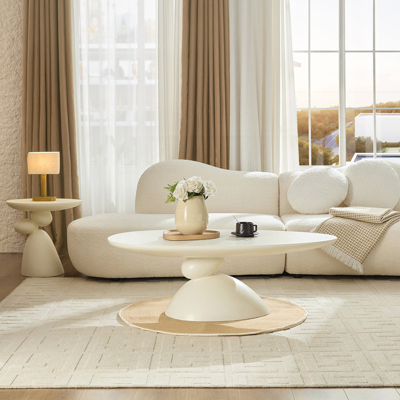 Table basse ovale en fibre de verre 47,27 "avec base sculpturale, Blanc lait