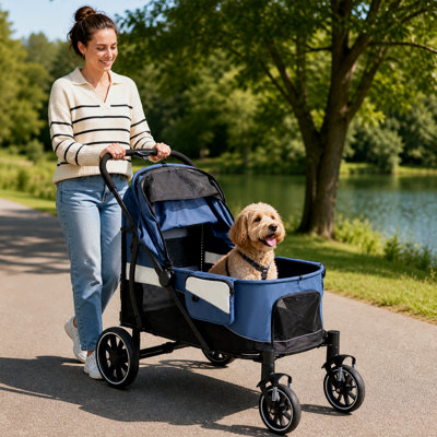 Poussette pour grand chien (capacité de 63,5 kg) avec rampe d'accès arrière, pliage à une main, frein au pied, roues pivotantes à 360° et wagon tout-terrain en filet aéré, bleu