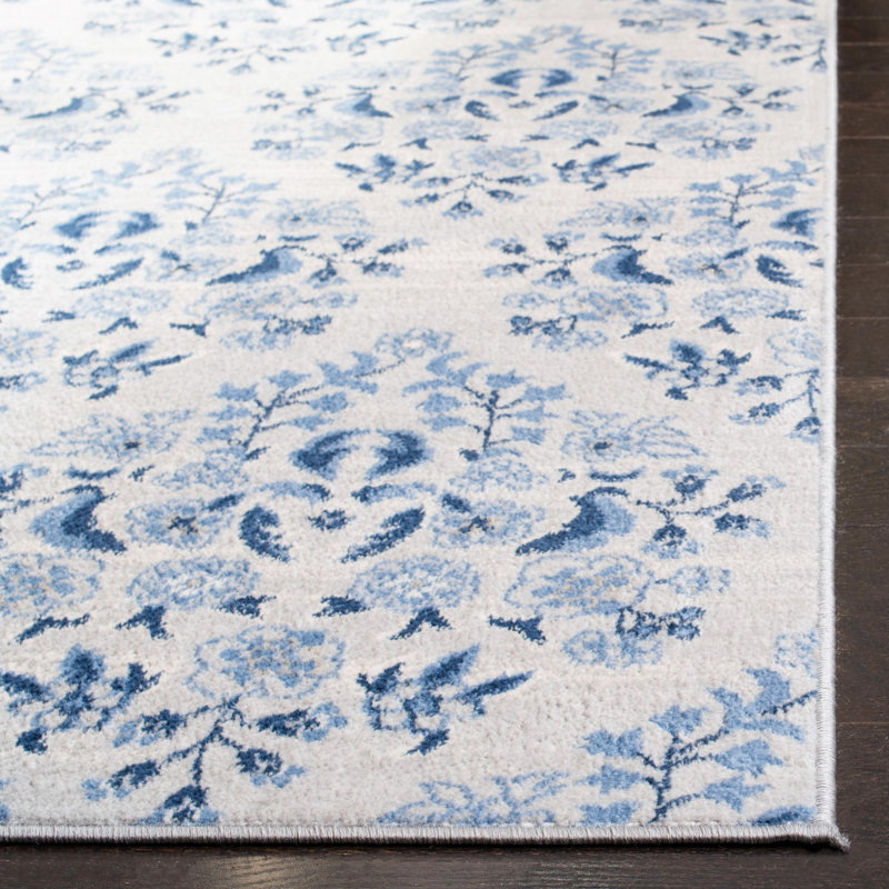 Blue and Cream Floral Synthetic 11' x 15' Area Rug