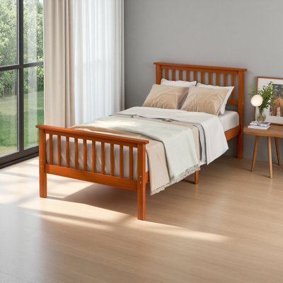 Lit plateforme en bois avec tête et pied de lit