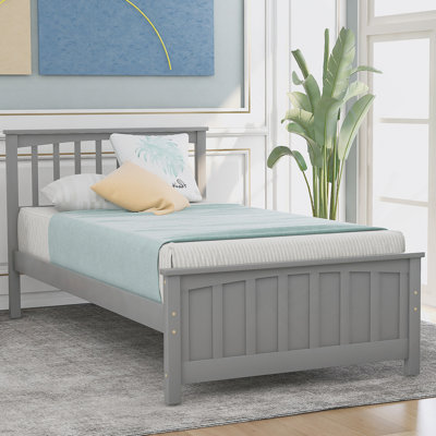 Lit plateforme en bois robuste et confortable au design élégant pour une esthétique et une détente améliorées dans la chambre à coucher