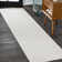 Yaniyah Classic Solid Low-Pile Machine-Washable Cream Rug