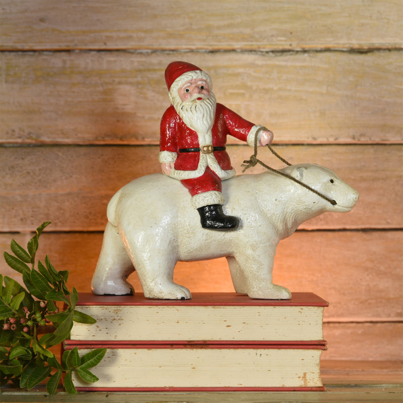 Ours polaire en fonte avec père Noël